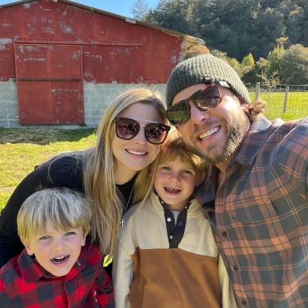Max Theiriot with his wife Lexi Murphy and two kids.